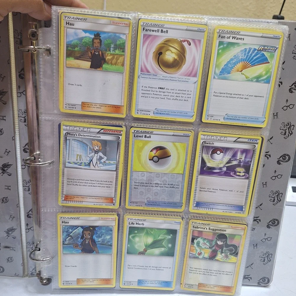 Pokémon TCG binder collection lot with approximately 171 cards from multiple set